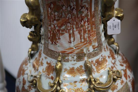 A large Chinese Canton-decorated coral red and gilt decorated vase, 19th century, 89cm, damaged